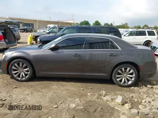 2018 Chrysler 300 Touring with VIN 2C3CCAAGXJH164931, listed as a IAAI auction lot 41942482 with 181,335 mi miles and . Bid and sale history available at DreamBid. Image 14.