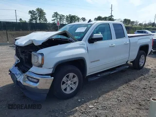 2017 GMC Sierra 1500 SLE z VIN 1GTV2MEC0HZ291794, wystawiony jako IAAI lot #42055172 z przebiegiem 235 969 mil mil oraz . Historia ofert i sprzedaży dostępna na DreamBid. Obrazek 2.