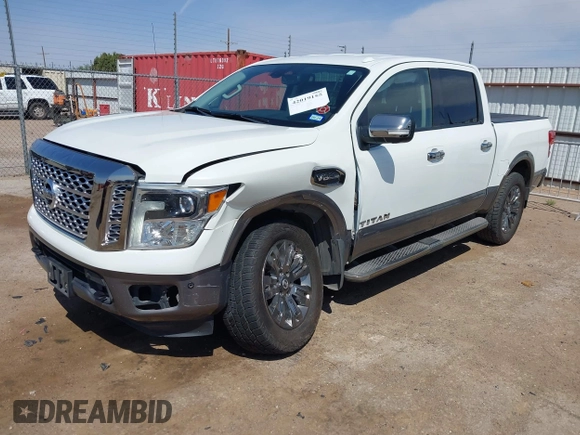 2017 Nissan Titan SV with VIN 1N6AA1E5XHN532587, listed as a IAAI auction lot 42019155 with 90,496 mi miles and . Bid and sale history available at DreamBid. Image 2.