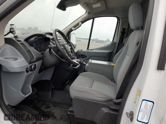 2016 Ford Transit Cargo with VIN 1FTYR2ZMXGKA99273, listed as a Copart auction lot 59289105 with 165,185 mi miles and Salvage title. Bid and sale history available at DreamBid. Image 7.