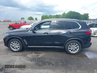 2020 BMW X5 xDrive40i with VIN 5UXCR6C04L9D63551, listed as a IAAI auction lot 42505561 with 56,763 mi miles and . Bid and sale history available at DreamBid. Image 14.