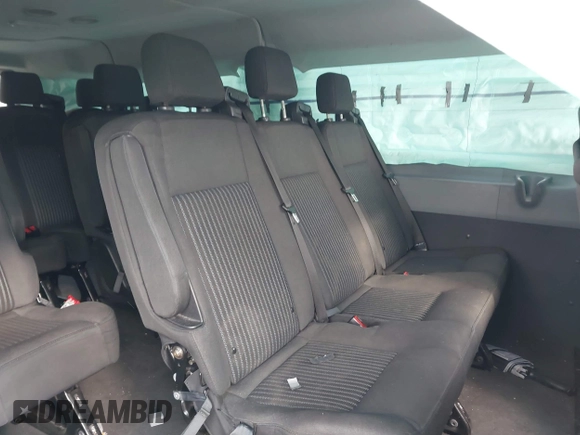 2018 Ford Transit Passenger XL z VIN 1FBZX2YM5JKA57441, wystawiony jako IAAI lot #41257346 z przebiegiem 71 702 mil mil oraz . Historia ofert i sprzedaży dostępna na DreamBid. Obrazek 8.