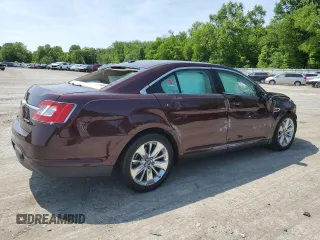 2011 Ford Taurus Limited with VIN 1FAHP2FW6BG157070, listed as a Copart auction lot 59300415 with 143,314 mi miles and Salvage title. Bid and sale history available at DreamBid. Image 3.