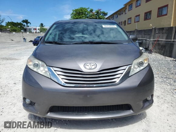 2015 Toyota Sienna XLE with VIN 5TDYK3DCXFS668851, listed as a Copart auction lot 60452005 with 205,549 mi miles and Salvage title. Bid and sale history available at DreamBid. Image 5.