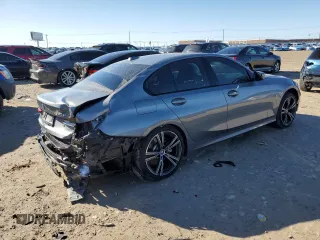 2023 BMW 3 Series 330e xDrive with VIN 3MW39FS07P8D00974, listed as a Copart auction lot 84912304 with 18,879 mi miles and Salvage Title. Bid and sale history available at carsss.com. Image 3.