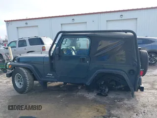 2005 Jeep Wrangler SE with VIN 1J4FA29S45P333916, listed as a IAAI auction lot 41214841 with 90,577 mi miles. Bid and sale history available at carsss.com. Image 14.