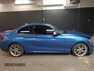 2016 BMW 2 Series M235i with VIN WBA1J7C58GV360712, listed as a IAAI auction lot 41975610 with 18,258 mi miles. Bid and sale history available at carsss.com. Image 13.