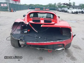 2005 Lotus Elise z VIN SCCPC11155HL31960, wystawiony jako IAAI lot #42274316 z przebiegiem 97 679 mil mil oraz . Historia ofert i sprzedaży dostępna na DreamBid. Obrazek 16.