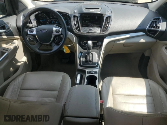 2013 Ford Escape SEL with VIN 1FMCU0HX4DUC48961, listed as a Copart auction lot 52630795 with 179,786 mi miles and Salvage Title. Bid and sale history available at DreamBid. Image 8.