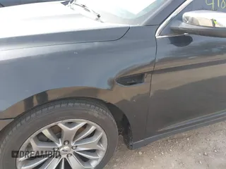 2013 Ford Taurus Limited with VIN 1FAHP2F80DG114817, listed as a IAAI auction lot 41865803 with 207,132 mi miles. Bid and sale history available at carsss.com. Image 12.