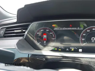 2024 Audi Q8 e-tron Prestige z VIN WA16ABGE6RB005963, wystawiony jako IAAI lot #42067970 z przebiegiem 7 113 mil mil oraz . Historia ofert i sprzedaży dostępna na DreamBid. Obrazek 17.
