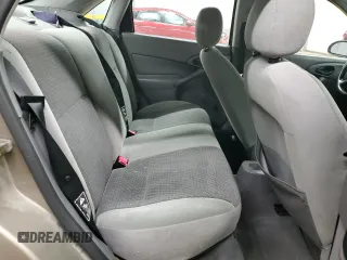 2003 Ford Focus LX with VIN 1FAFP33P63W257719, listed as a Copart auction lot 83937554 with 75,967 mi miles and Salvage Title. Bid and sale history available at carsss.com. Image 10.