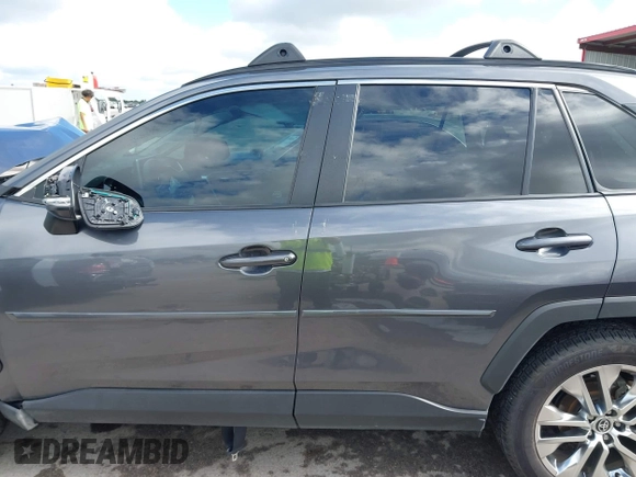 2021 Toyota RAV4 XLE Premium with VIN 2T3C1RFVXMC111658, listed as a IAAI auction lot 42594838 with 58,734 mi miles and . Bid and sale history available at DreamBid. Image 14.