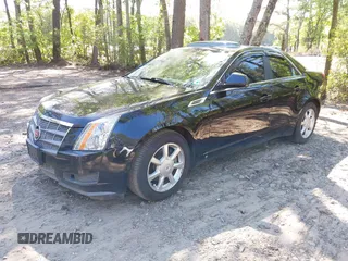 2009 Cadillac CTS RWD w/1SB with VIN 1G6DU57V590105458, listed as a IAAI auction lot 42139093 with 105,983 mi miles. Bid and sale history available at carsss.com. Image 2.