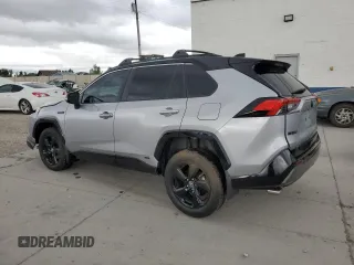 2021 Toyota RAV4 Hybrid XSE with VIN 4T3E6RFV2MU016441, listed as a Copart auction lot 57090975 with 69,304 mi miles and Salvage title. Bid and sale history available at DreamBid. Image 2.
