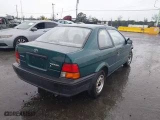 1996 Toyota Tercel DX with VIN JT2AC52L9T0127262, listed as a IAAI auction lot 41504210 with 135,732 mi miles. Bid and sale history available at carsss.com. Image 4.