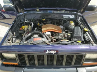 1998 Jeep Cherokee Sport with VIN 1J4FJ68S1WL149793, listed as a Copart auction lot 73976814 with 0 mi miles and Salvage Title. Bid and sale history available at carsss.com. Image 12.