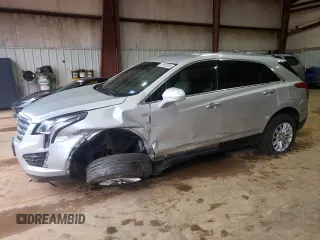 2019 Cadillac XT5 FWD with VIN 1GYKNARS1KZ231504, listed as a Copart auction lot 51952355 with 54,243 mi miles and Salvage title. Bid and sale history available at DreamBid. Image 1.
