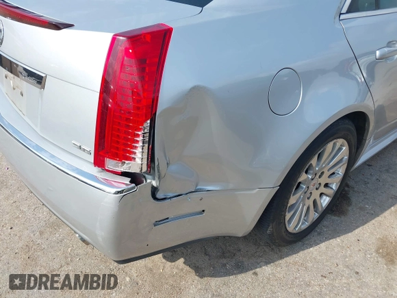 2012 Cadillac CTS Performance z VIN 1G6DJ5E37C0145221, wystawiony jako IAAI lot #42111935 z przebiegiem 82 103 mil mil oraz . Historia ofert i sprzedaży dostępna na DreamBid. Obrazek 12.