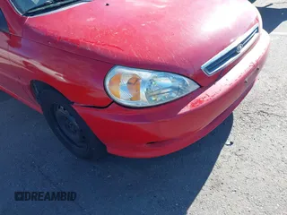2002 Kia Rio with VIN KNADC123126182360, listed as a IAAI auction lot 41526651 with 82,052 mi miles. Bid and sale history available at carsss.com. Image 6.