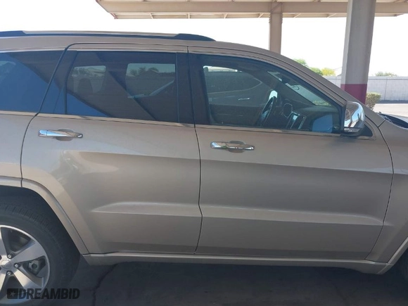 2014 Jeep Grand Cherokee Overland with VIN 1C4RJFCT4EC400565, listed as a IAAI auction lot 41937436 with 56,481 mi miles. Bid and sale history available at carsss.com. Image 12.