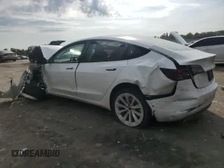 2022 Tesla Model 3 Long Range z VIN 5YJ3E1EB5NF290131, wystawiony jako Copart lot #61128624 z przebiegiem 57 274 mil mil oraz Szkoda całkowita • Salvage title. Historia ofert i sprzedaży dostępna na DreamBid. Obrazek 2.