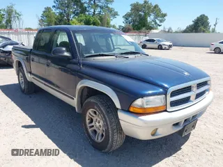 2003 Dodge Dakota SLT with VIN 1D7HL48N63S158682, listed as a IAAI auction lot 41964332 with 278,390 mi miles. Bid and sale history available at carsss.com. Image 1.