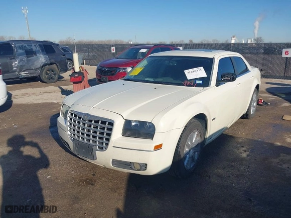2008 Chrysler 300 Touring with VIN 2C3LA53G08H283303, listed as a IAAI auction lot 41680375 with 210,765 mi miles. Bid and sale history available at carsss.com. Image 2.