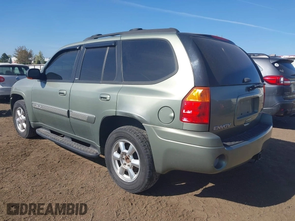 2003 GMC Envoy SLT with VIN 1GKDT13S932373739, listed as a IAAI auction lot 42122017 with 155,963 mi miles. Bid and sale history available at carsss.com. Image 3.