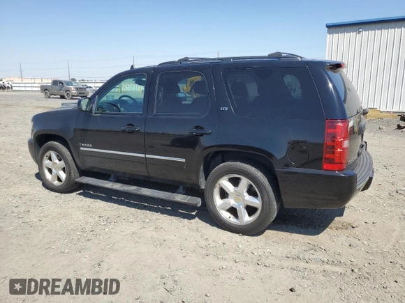 2010 Chevrolet Tahoe LTZ with VIN 1GNUKCE08AR117979, listed as a Copart auction lot 64802225 with 228,769 mi miles and Salvage title. Bid and sale history available at DreamBid. Image 2.