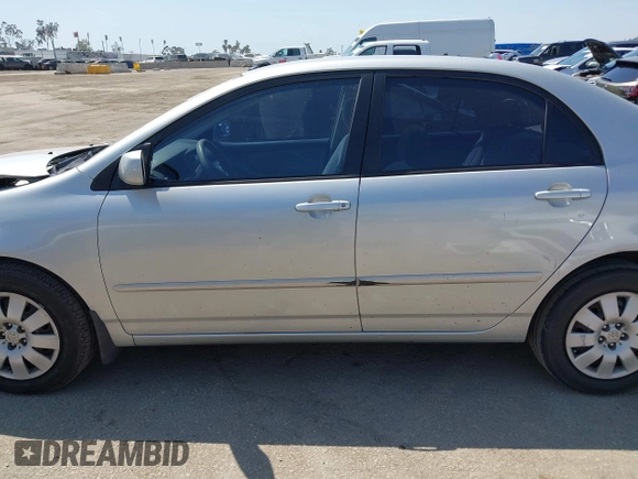 2004 Toyota Corolla CE with VIN 1NXBR32E14Z262676, listed as a IAAI auction lot 41992616 with 168,255 mi miles. Bid and sale history available at carsss.com. Image 14.