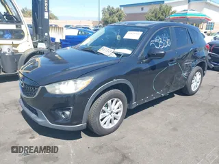 2013 Mazda CX-5 Touring with VIN JM3KE2CEXD0153589, listed as a IAAI auction lot 41855356 with 86,030 mi miles and . Bid and sale history available at DreamBid. Image 17.