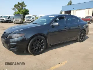2012 Lincoln MKS EcoBoost with VIN 1LNHL9FTXCG805818, listed as a Copart auction lot 70817614 with 126,659 mi miles and Clean title. Bid and sale history available at DreamBid. Image 1.