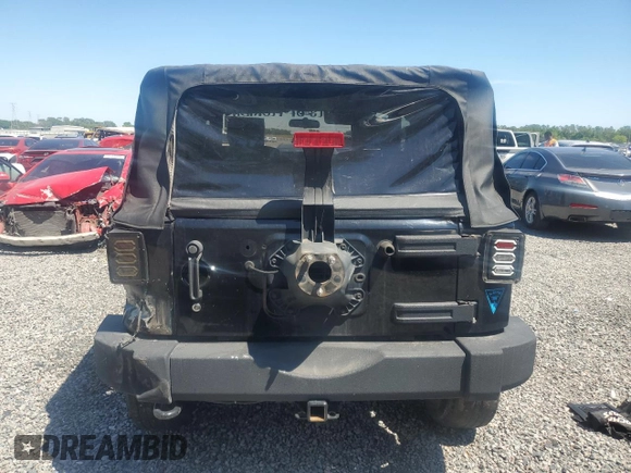 2010 Jeep Wrangler Sahara z VIN 1J4AA5D10AL204437, wystawiony jako Copart lot #50743665 z przebiegiem 211 585 mil mil oraz Szkoda całkowita • Salvage title. Historia ofert i sprzedaży dostępna na DreamBid. Obrazek 6.