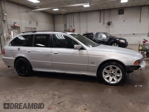 2003 BMW 5 Series 525iT with VIN WBADS33413GD50535, listed as a IAAI auction lot 41405870 with 180,748 mi miles. Bid and sale history available at carsss.com. Image 14.