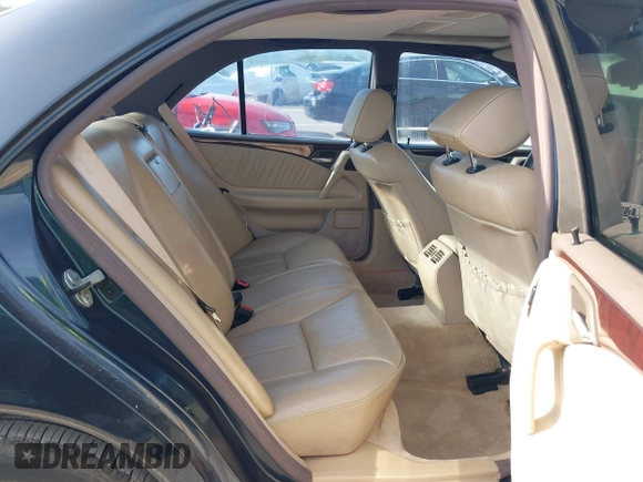 1997 Mercedes-Benz E-Class with VIN WDBJF55F7VJ027080, listed as a IAAI auction lot 42120838 with 150,197 mi miles. Bid and sale history available at carsss.com. Image 8.