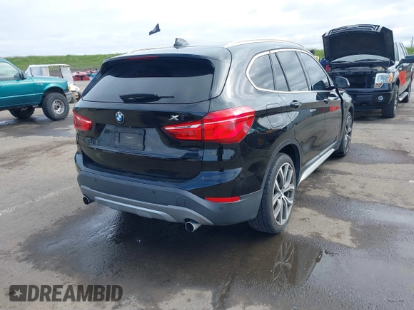 2017 BMW X1 sDrive28i with VIN WBXHU7C3XHP924635, listed as a IAAI auction lot 41744824 with 74,143 mi miles. Bid and sale history available at carsss.com. Image 4.