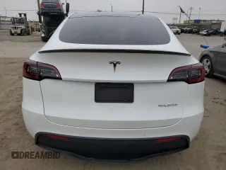 2022 Tesla Model Y Performance с VIN 7SAYGDEFXNF384268, выставлен на аукционе Copart как лот 60141005 с пробегом Не указан миль и Списание • Salvage title. История ставок и продаж доступна на DreamBid. Изображение 6.