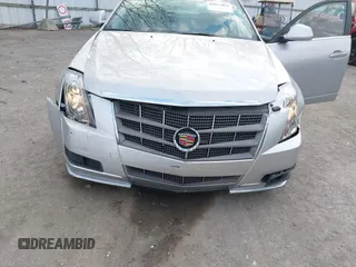 2011 Cadillac CTS Luxury with VIN 1G6DG5EY9B0143057, listed as a IAAI auction lot 42023052 with 72,576 mi miles and . Bid and sale history available at carsss.com. Image 6.