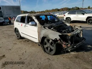 2013 Jeep Grand Cherokee Overland with VIN 1C4RJFCG5DC639401, listed as a Copart auction lot 79003094 with 0 mi miles and Salvage Title. Bid and sale history available at carsss.com. Image 12.