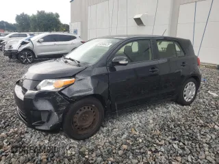 2012 Scion xD with VIN JTKKU4B4XC1028464, listed as a Copart auction lot 62466425 with 146,318 mi miles and Salvage title. Bid and sale history available at DreamBid. Image 1.