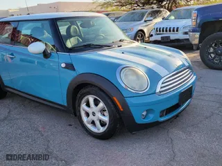 2009 MINI Cooper Hardtop with VIN WMWMF33599TW76321, listed as a Copart auction lot 51955375 with 90,988 mi miles and Clean Title. Bid and sale history available at carsss.com. Image 1.