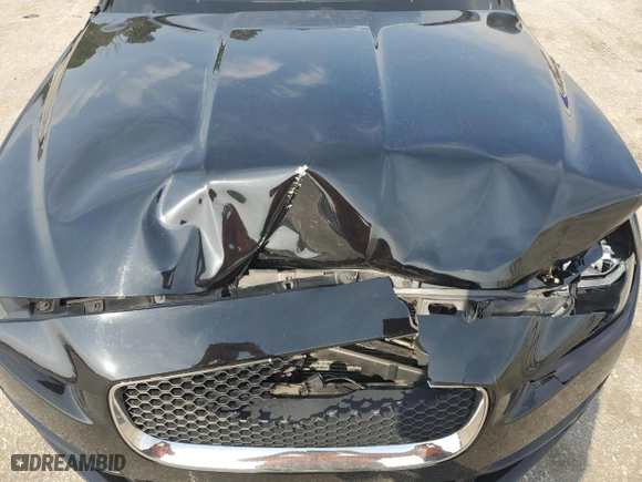 2017 Jaguar XE 25t with VIN SAJAR4BGXHA965404, listed as a Copart auction lot 49105855 with 76,990 mi miles and Salvage Title. Bid and sale history available at carsss.com. Image 13.