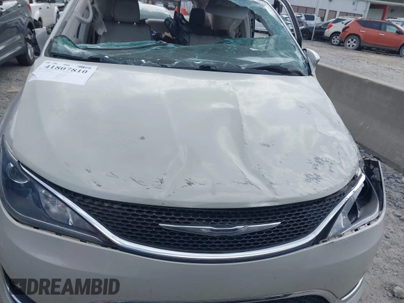 2017 Chrysler Pacifica Limited with VIN 2C4RC1GG9HR560544, listed as a IAAI auction lot 41807810 with 137,768 mi miles and . Bid and sale history available at DreamBid. Image 6.