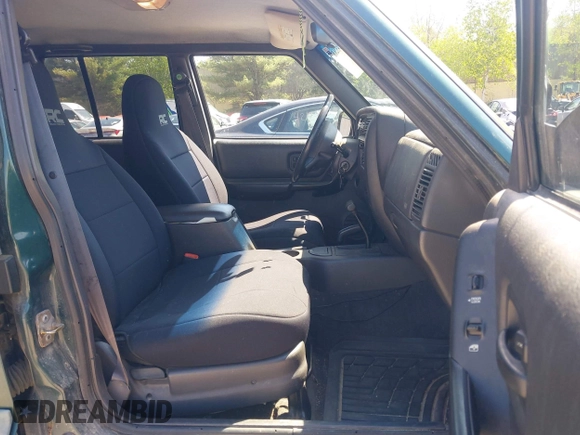 2000 Jeep Cherokee z VIN 1J4FF48S2YL253251, wystawiony jako IAAI lot #42243268 z przebiegiem 154 136 mil mil oraz . Historia ofert i sprzedaży dostępna na DreamBid. Obrazek 5.