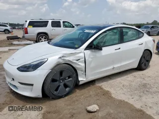 2023 Tesla Model 3 with VIN 5YJ3E1EAXPF600008, listed as a Copart auction lot 61063675 with 58,733 mi miles and Salvage title. Bid and sale history available at DreamBid. Image 1.