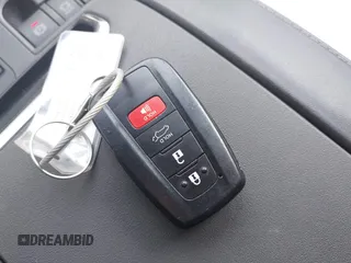 2023 Toyota Highlander L with VIN 5TDKDRBH5PS012608, listed as a IAAI auction lot 42702499 with 61,129 mi miles and . Bid and sale history available at DreamBid. Image 11.