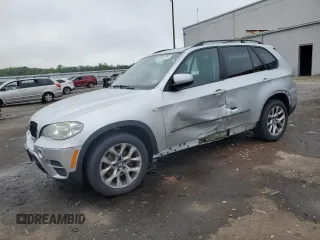 2012 BMW X5 35i с VIN 5UXZV4C57CL747717, выставлен на аукционе Copart как лот 63003135 с пробегом 135 999 миль миль и Чистый • Clean title. История ставок и продаж доступна на DreamBid. Изображение 1.