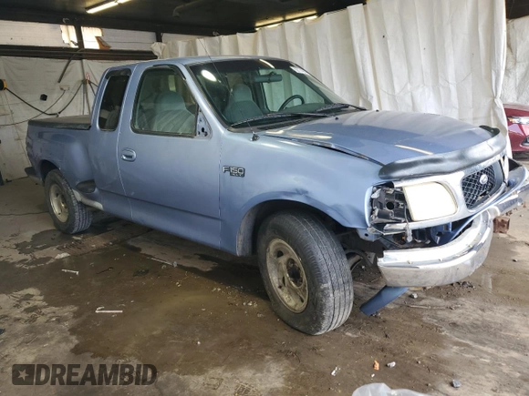 1997 Ford F-150 with VIN 1FTDX076XVKC72073, listed as a Copart auction lot 62774955 with 204,105 mi miles and Salvage title. Bid and sale history available at DreamBid. Image 4.