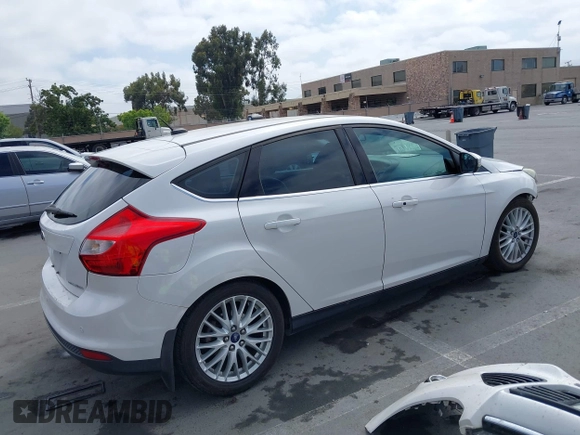 2014 Ford Focus Titanium with VIN 1FADP3N24EL186050, listed as a IAAI auction lot 42481684 with 187,687 mi miles and . Bid and sale history available at DreamBid. Image 4.